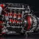 Ist Chiptuning schädlich? Schnittbild eines Turbomotors mit Getriebe, Turbolader, Kolben und Kupplung rot markiert